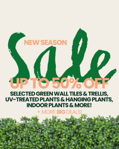Advertisement for a sale on green wall tiles, trellises, and plants with a green plant in the foreground.