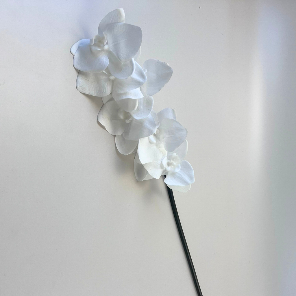 Artificial Phalaenopsis orchid with bright white blooms 