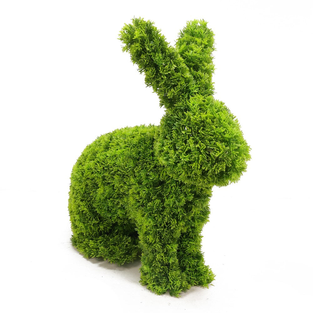 Green rabbit-shaped artificial topiary pet on a white background