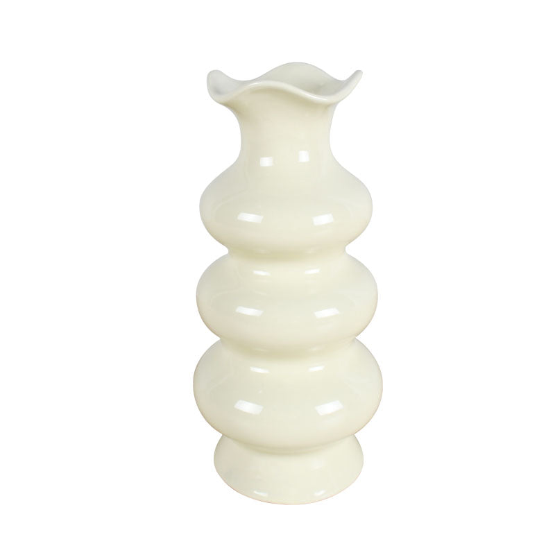 Decorative 24cm white ceramic vase featuring bubble-like curves and a wavy edge against a plain white background
