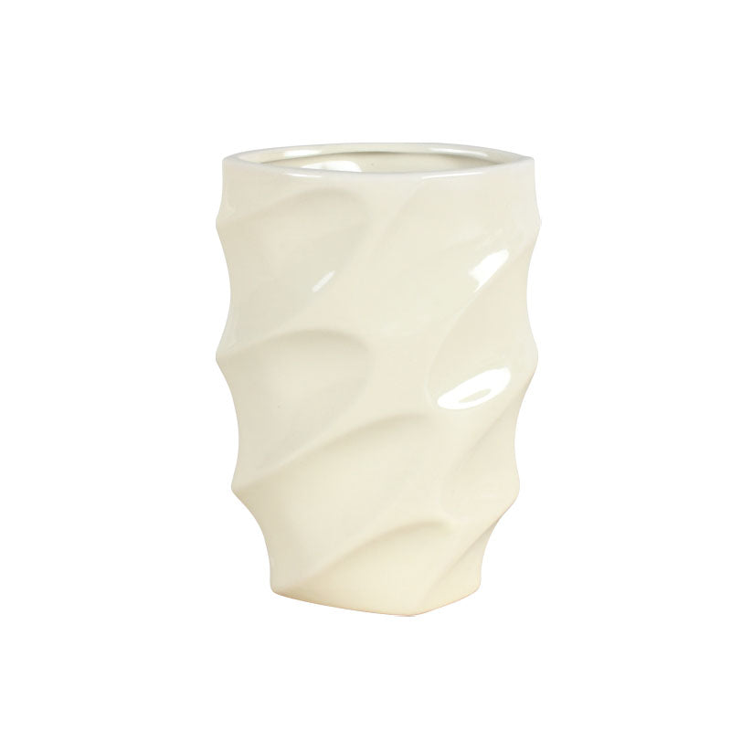 Textured 17cm ceramic vase with a rippled and glossy finish against a white background