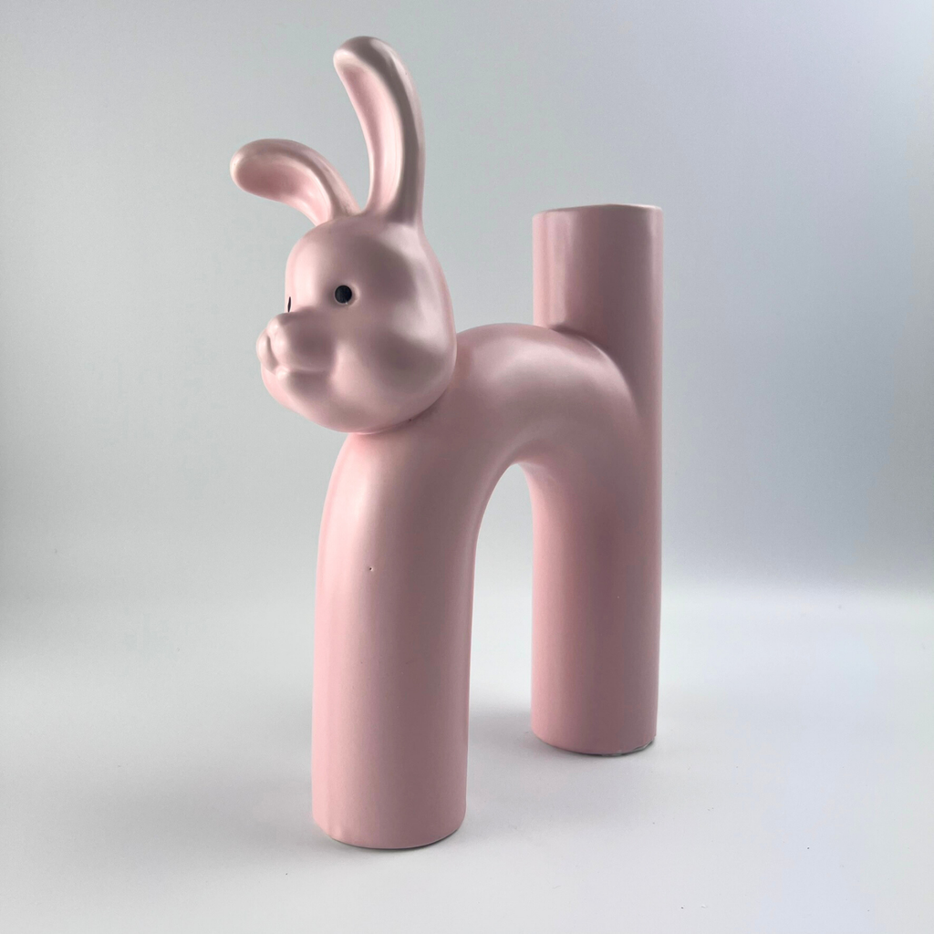 Quirky pink ceramic vase that's shaped like a rabbit 