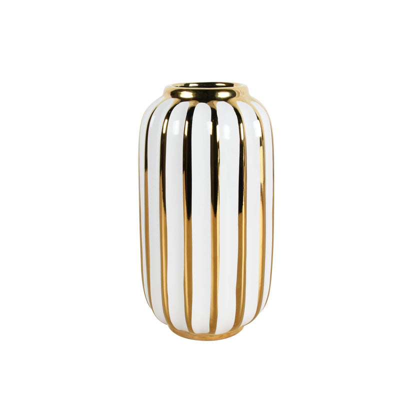 Ceramic cylindrical vase with a gold and white striped design against a white background