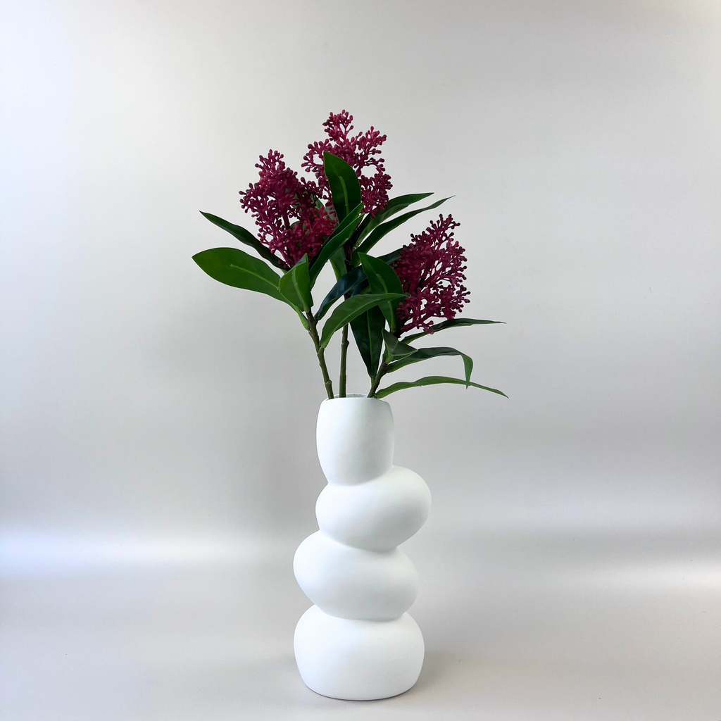 Modern white vase with four bubbles styled florals 