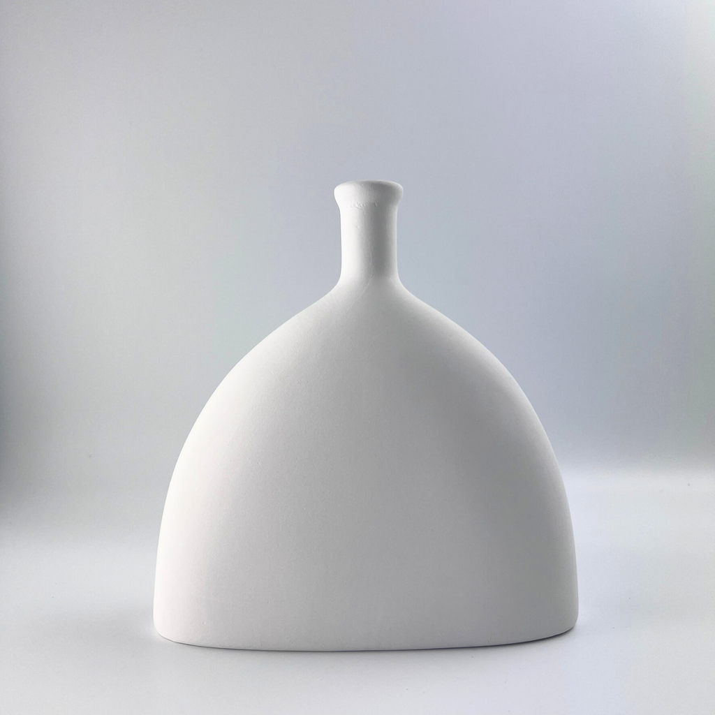 White ceramic vase with a unique design