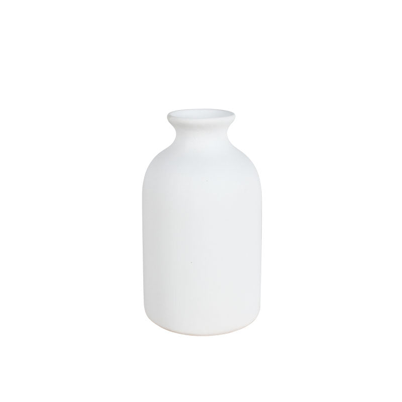 14cm off-white ceramic vase with a silhouette shaped like traditional milk bottle against a plain white background